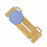 Wooden transfer board with a blue circular object on a white background