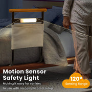 Bed assist rail with motion sensor night light for safer nighttime movement beside the bed